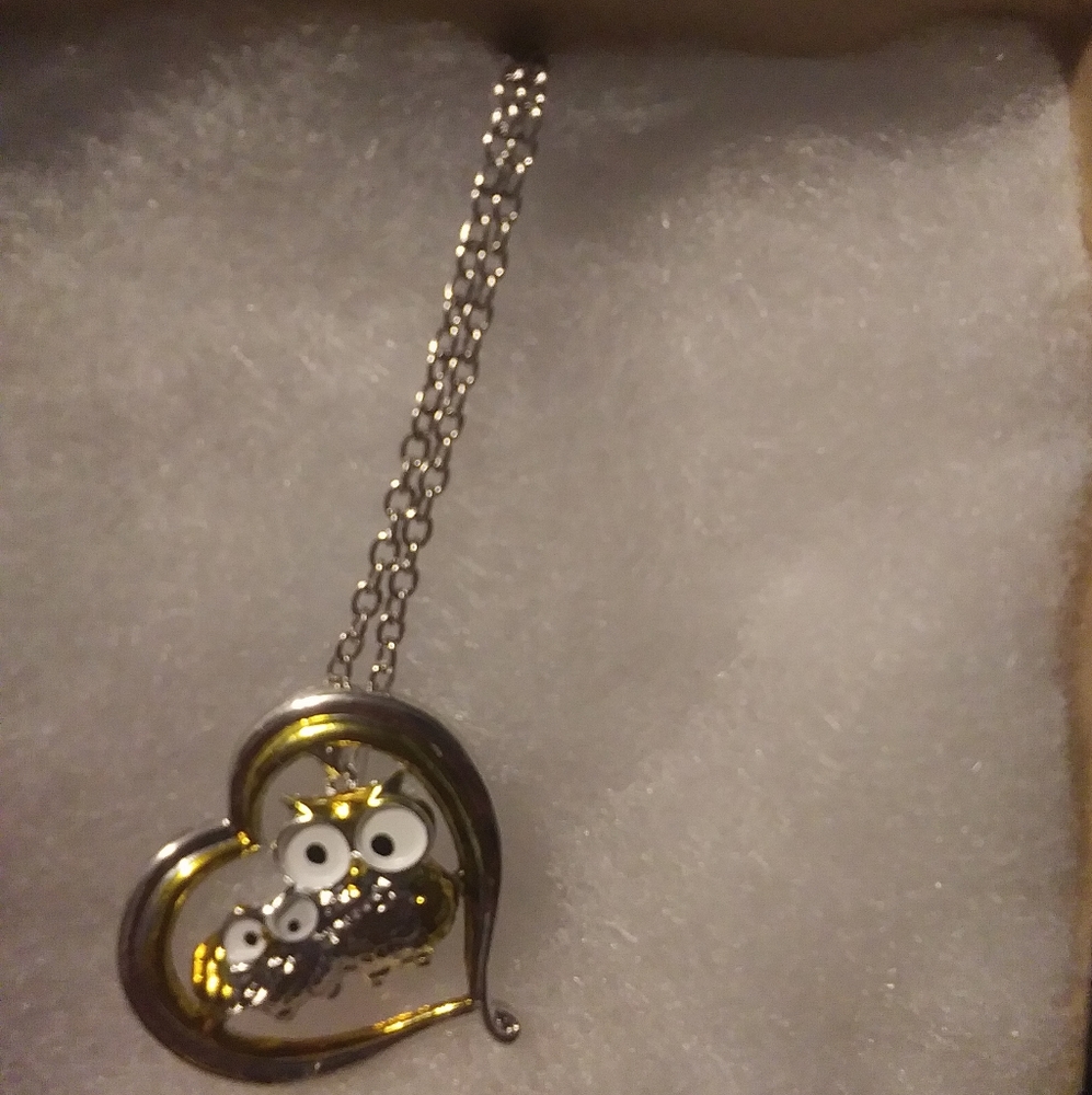 Owl necklace. Gold and silver